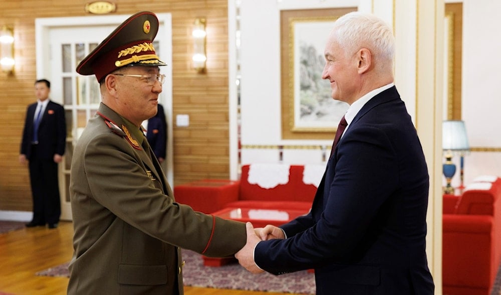 DPRK Defense Minister No Kwang Chol, left, and Russian Defense Minister Andrei Belousov, right, shake hands during their meeting in Pyongyang, DPRK, Nov. 29, 2024. (Vadim Savitsky, Russian Defense Ministry Press Service via AP)