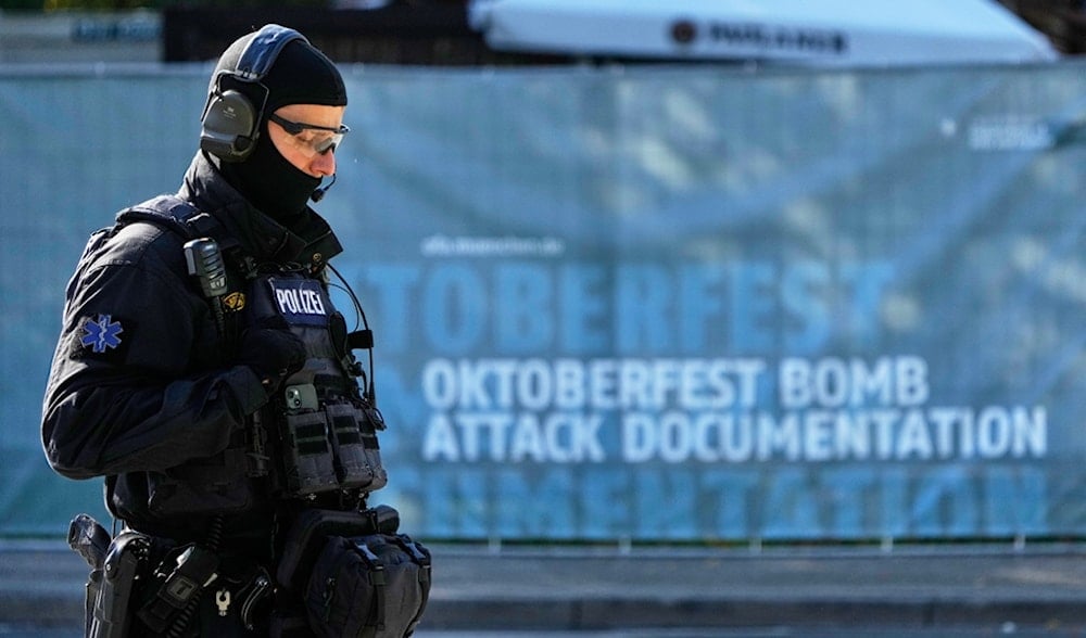 A police officer walks at the Oktoberfest area that stays closed after a bomb threat in Munich, Germany, Wednesday, Oct.1, 2025. (AP)