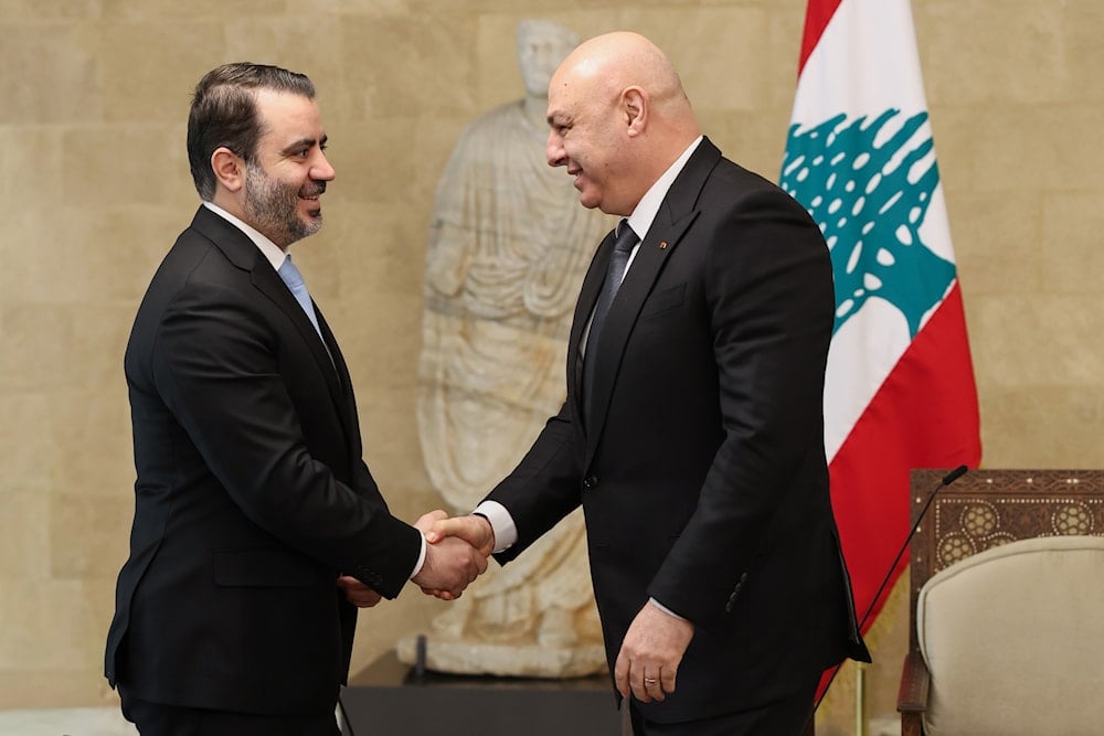 Lebanese President Joseph Aoun, shakes hands with Syrian Foreign Minister Asaad al-Shibani before their meeting at the presidential palace in Baabda, east of Beirut, Lebanon, Friday, Oct. 10, 2025 (AP)