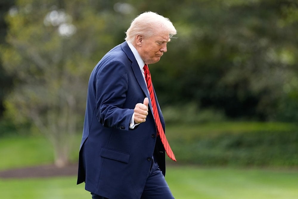 US President Donald Trump walks on the South Lawn after arriving on Marine One at the White House, Friday, October 10, 2025, in Washington. (AP Photo/Alex Brandon)