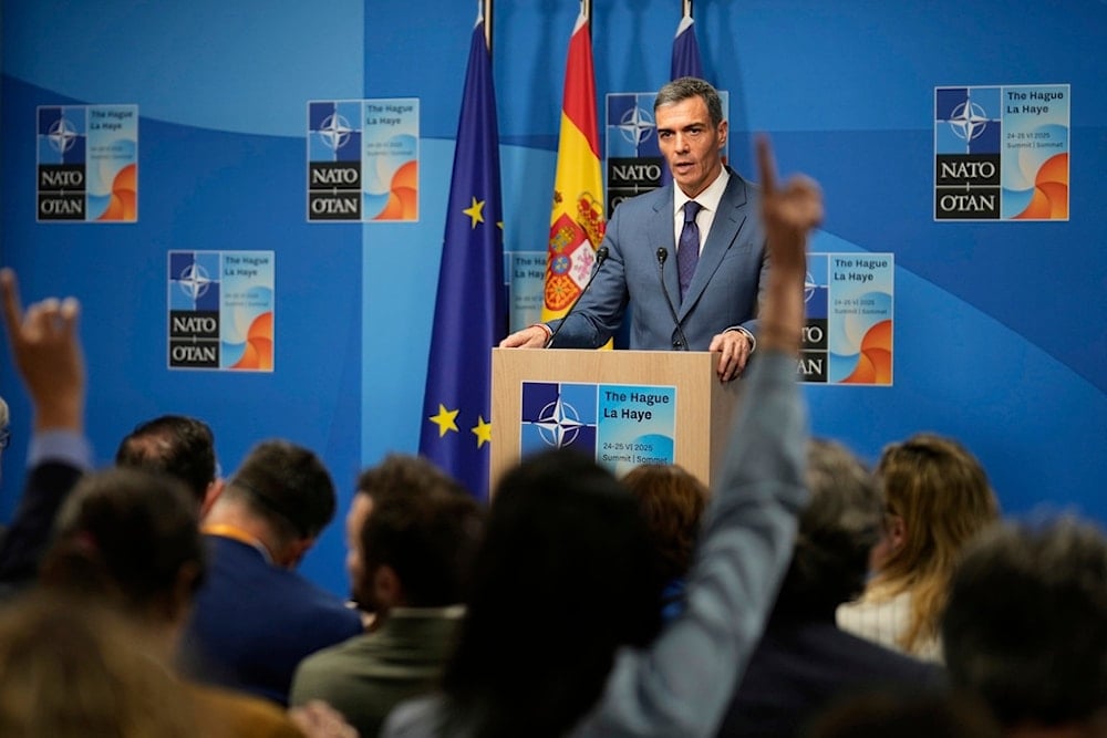 Spain's Prime Minister Pedro Sanchez speaks during a press conference after the plenary session at the NATO summit in The Hague, Netherlands, Wednesday, June 25, 2025. (AP Photo/Markus Schreiber)