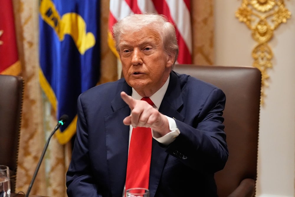 President Donald Trump speaks during a meeting with Argentina's President Javier Milei in the Cabinet Room of the White House, Tuesday, Oct. 14, 2025, in Washington (AP)