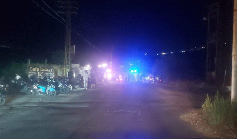 People gather around the site of an Israeli airstrike on southern Lebanon's Wadi Jilou, October 14, 2025 (Social media)