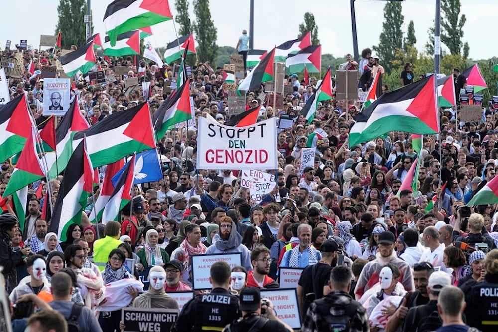 Thousands of people take part in a pro Palestine demonstration in Frankfurt, Germany, Saturday, Aug.30, 2025. (AP Photo/Michael Probst)