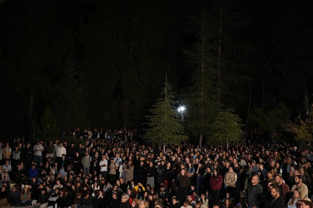 Mourners attend the funeral of slain captive Captain Daniel Peretz at Mt. Herzl military cemetery in occupied al-Quds, Wednesday, October 15, 2025 (AP)