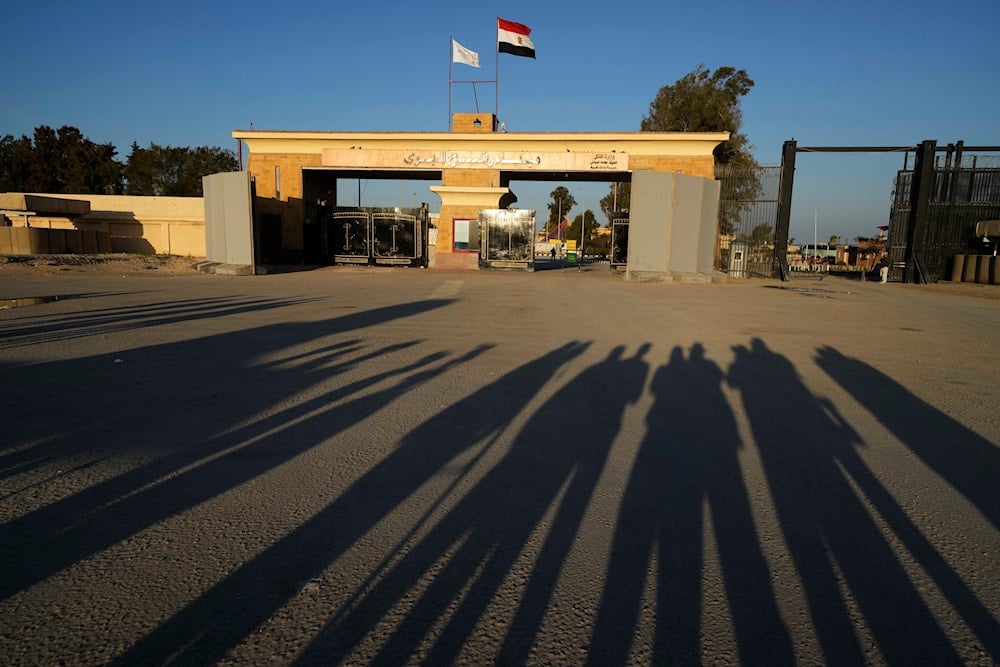 Members of the media wait for Palestinian prisoners and injured at the Rafah border crossing in Egypt, Saturday, Feb. 1, 2025 (AP)