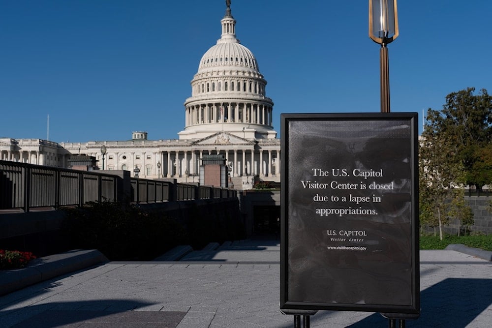 With the government shutdown now in its third week, a sign turns away tourists at the entrance to the Capitol Visitor Center, in Washington, Wednesday, October 15, 2025. (AP Photo/J. Scott Applewhite)
