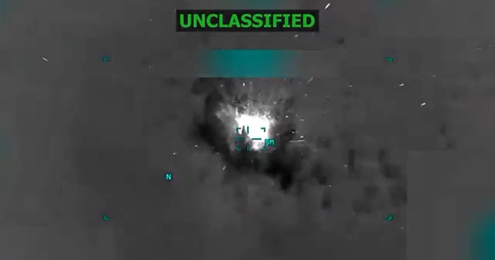 Screengrab taken from US Minister of War Pete Hegseth's social media account showing the US operation against a vessel of the Venezuelan coast on October 14, 2025. (X/@PeteHegseth)