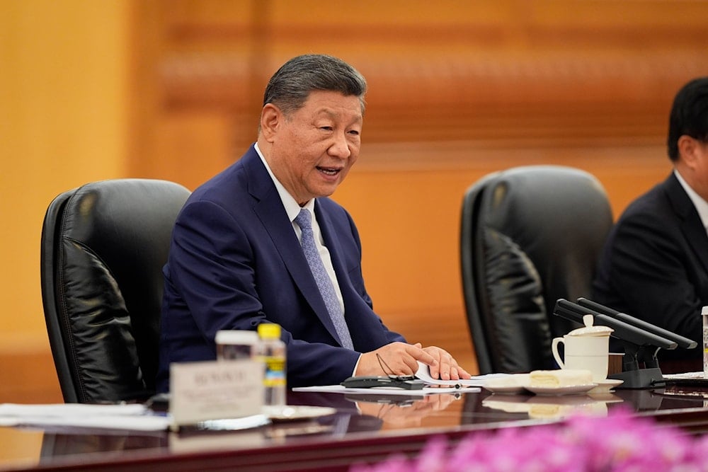 Chinese President Xi Jinping speaks during a meeting with Sri Lanka's Prime Minister Harini Amarasuriya at the Great Hall of the People in Beijing, China, on October 14, 2025. (Ichiro Banno/Pool Photo via AP)