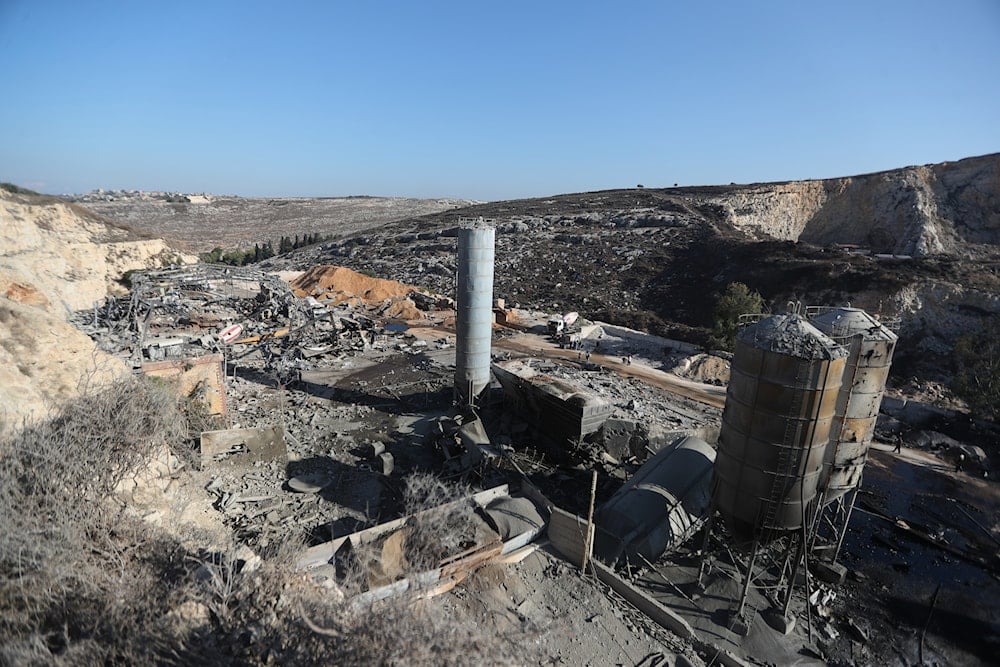 People inspect the site of an Israeli airstrike on a cement plant in the southern Lebanese village of Ansar, Lebanon, Friday, Oct. 17, 2025 (AP)