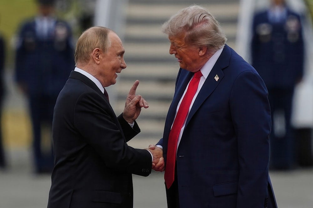 President Donald Trump greets Russia's President Vladimir Putin Friday, Aug. 15, 2025, at Joint Base Elmendorf-Richardson, Alaska (AP)