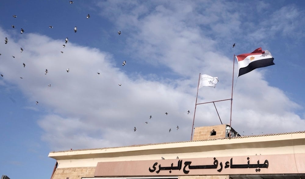 Birds fly over Rafah crossing, Egypt, as a temporary ceasefire went into effect, Monday, Nov. 27, 2023. (AP)