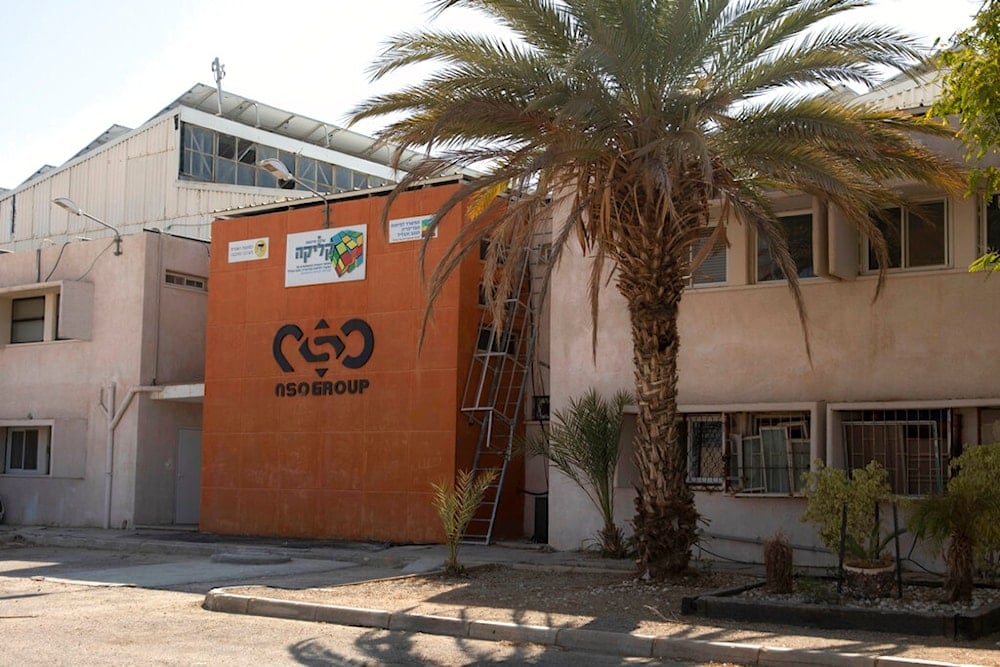 A logo is shown on a branch office of the Israeli NSO Group company near the southern Israeli settlement of Sapir on August 24, 2021. (AP Photo/Sebastian Scheiner)