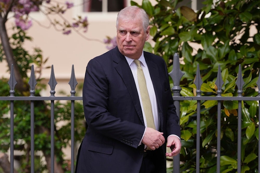 Prince Andrew looks round as he leaves after attending the Easter Matins Service at St. George's Chapel, Windsor Castle, England, April 20, 2025 (AP)