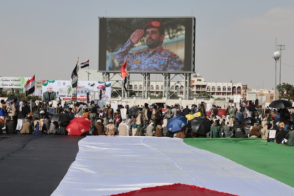 A picture showing Martyr Maj. Gen. Mohammed Abdul Karim al-Ghamari, is displayed during an anti-US and anti-Israeli rally in Sanaa, Yemen, Friday, October 17, 2025 (AP)