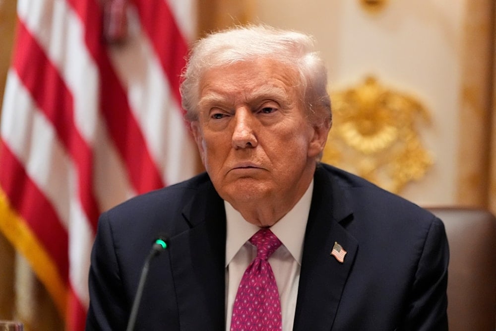 President Donald Trump attends a lunch with Ukraine's President Volodymyr Zelenskyy in the Cabinet Room of the White House, Friday, Oct. 17, 2025, in Washington. (AP Photo/Alex Brandon)