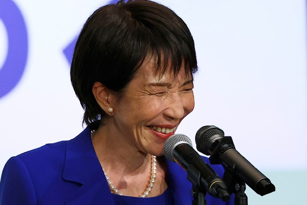 Newly-elected leader of Japan's Liberal Democratic Party (LDP) Sanae Takaichi smiles while delivering a speech after winning the LDP leadership election in Tokyo, Japan, Saturday, October 4, 2025. (Kim Kyung-Hoon/Pool Photo via AP)