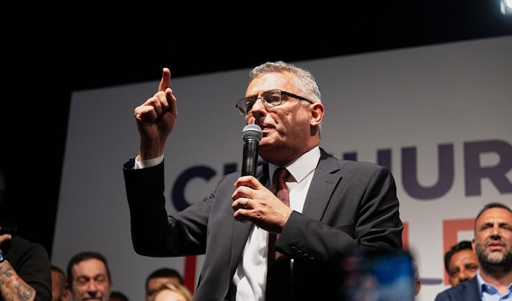 Turkish Cypriot newly elected leader Tufan Erhurman talks to supporters after winning the leadership election in the Turkish occupied northern part of the divided capital Nicosia, Cyprus, Sunday, Oct. 19, 2025. (AP)
