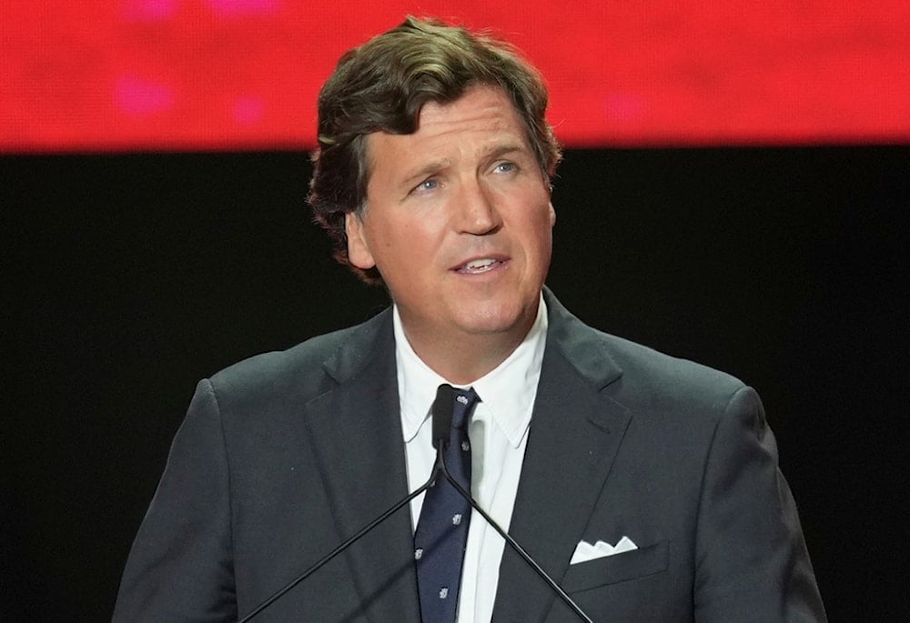 Tucker Carlson speaks at a memorial for Charlie Kirk, Sunday, September 21, 2025, at State Farm Stadium in Glendale, Arizona (AP)