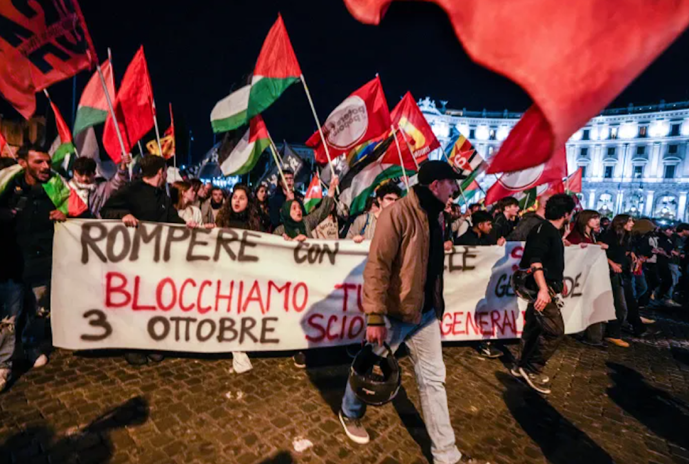 Pro-Palestine activists march in downtown Rome late on October 1, 2025 after news that the Sumud Flotilla was intercepted by Israeli forces. (AP)