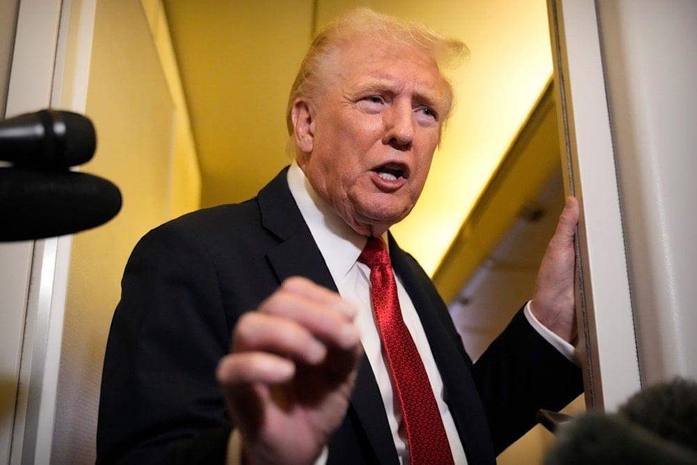 President Donald Trump speaks to reporters aboard Air Force One, Sunday, October 19, 2025, en route to Joint Base Andrews, Md., as he returns from a trip to Florida (AP)