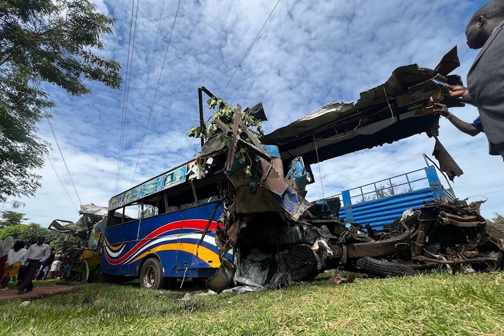 Wreckage of a bus involved in a collision that left several people dead near Kiryandongo on the highway from the Ugandan capital of Kampala to the city of Gulu in northern Uganda, Wednesday, Oct. 22, 2025 (AP)