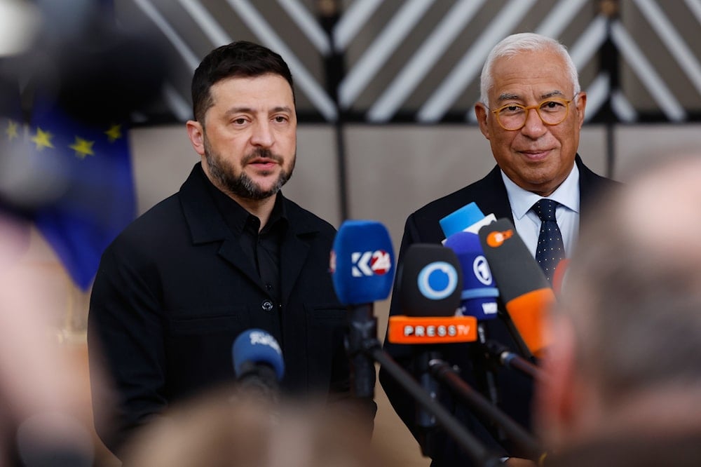Ukraine's President Volodymyr Zelenskyy, left, and European Council President Antonio Costa speak with the media as they arrive for an EU Summit at the European Council building in Brussels, on October 23, 2025. (AP Photo/Geert Vanden Wijngaert)