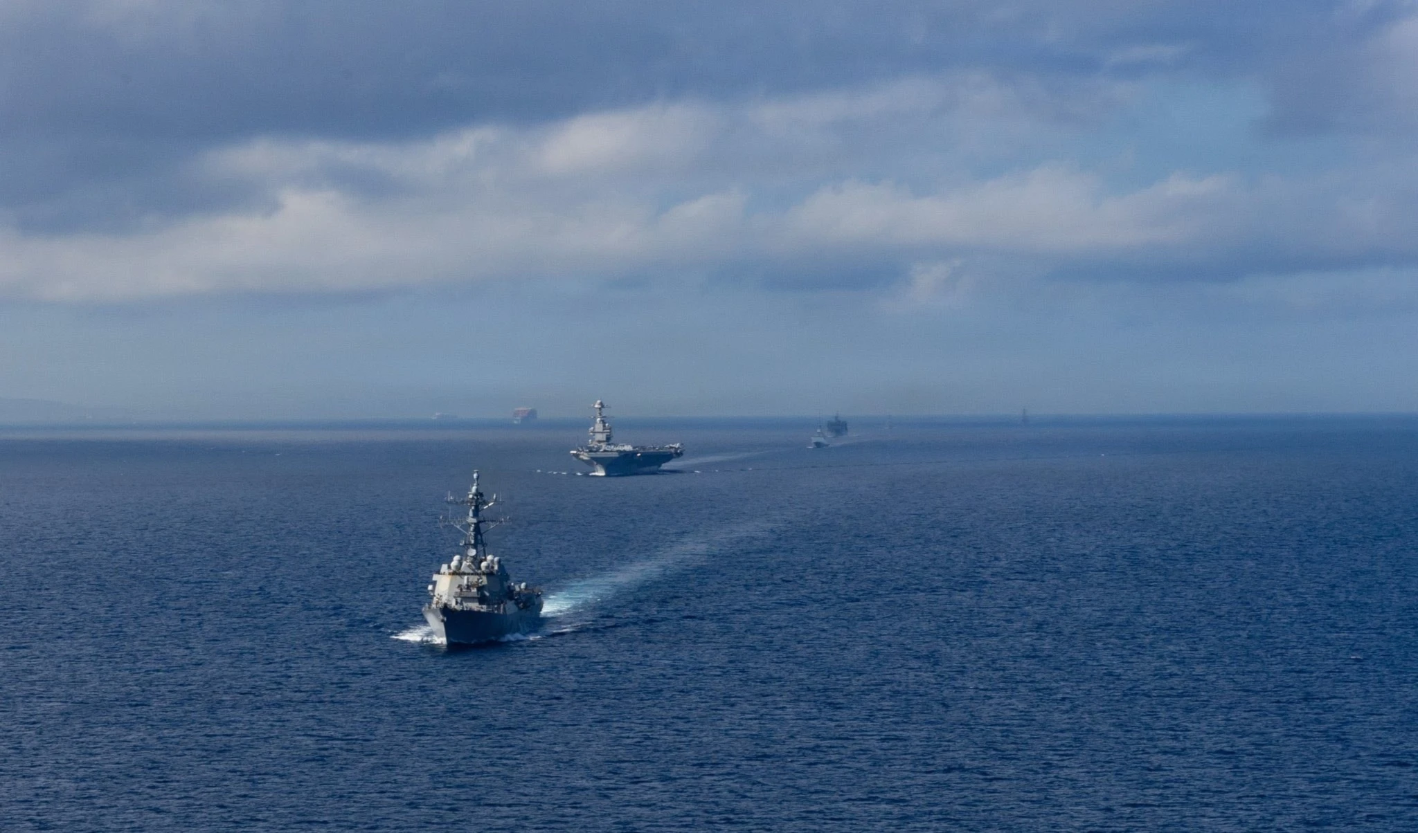 US Navy warships sail in formation during joint maritime exercises in the Caribbean Sea near the coast of Venezuela, part of ongoing operations with Trinidad and Tobago. US Navy warships sail in formation during joint maritime exercises in the Caribbean Sea near the coast of Venezuela, part of ongoing operations with Trinidad and Tobago.