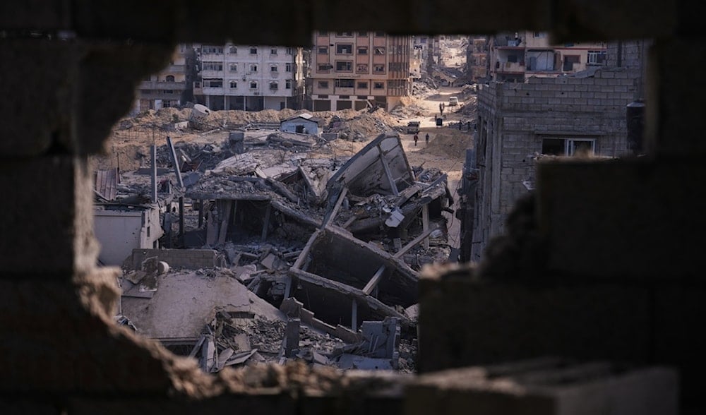 Buildings destroyed during the Israeli air and ground offensive are seen in the Al-Shati camp, in Gaza City, Friday, Oct. 24, 2025. (AP)