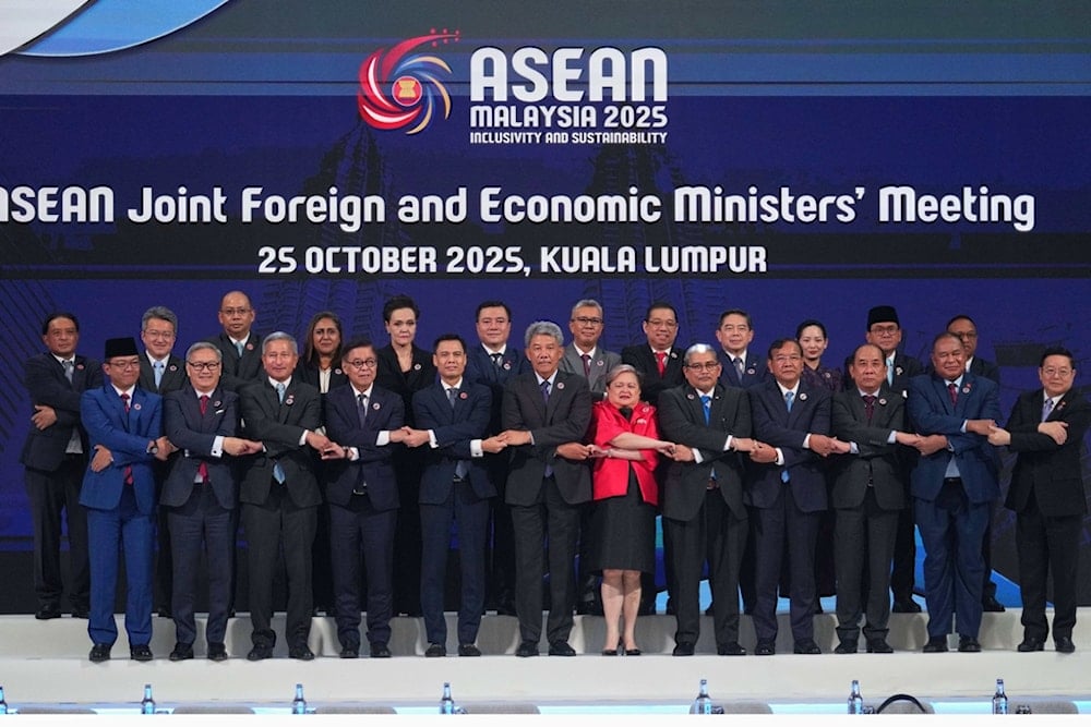 Foreign ministers and economic ministers of ASEAN member countries pose for a group photo during the ASEAN Joint Foreign and Economic Ministers' Meeting in Kuala Lumpur, Malaysia, on Saturday, October 25, 2025 (AP)
