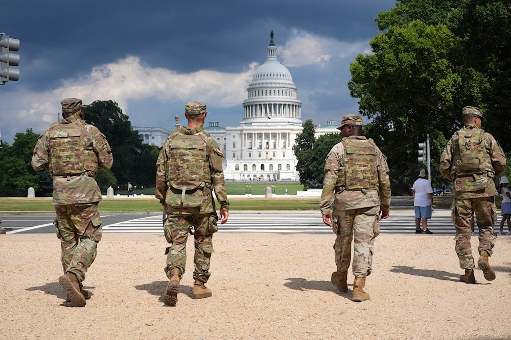 District of Columbia National Guard soldiers patrol on the National Mall, Thursday, August 14, 2025, in Washington (AP)