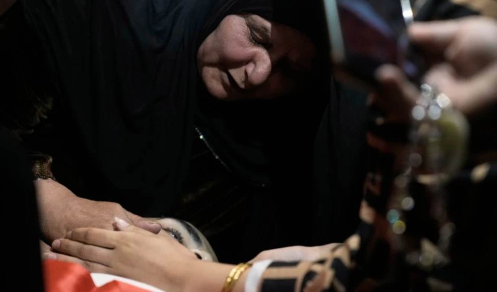 A Palestinian woman woman mourns over the the body of Mahdi Kamil, 20, who was killed in an Israeli military raid, during his funeral in the West Bank village of Qabatiya, Friday, Oct. 17, 2025. (AP) A Palestinian woman woman mourns over the the body of Mahdi Kamil, 20, who was killed in an Israeli military raid, during his funeral in the West Bank village of Qabatiya, Friday, Oct. 17, 2025. (AP)
