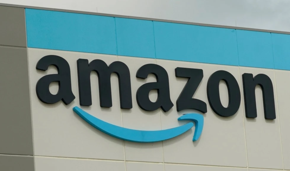 FILE - The Amazon logo is pictured at the Amazon Robotic Sorting Fulfillment Center in Madison County, Miss., Aug. 11, 2022. (AP Photo/Rogelio V. Solis, File) FILE - The Amazon logo is pictured at the Amazon Robotic Sorting Fulfillment Center in Madison County, Miss., Aug. 11, 2022. (AP Photo/Rogelio V. Solis, File)