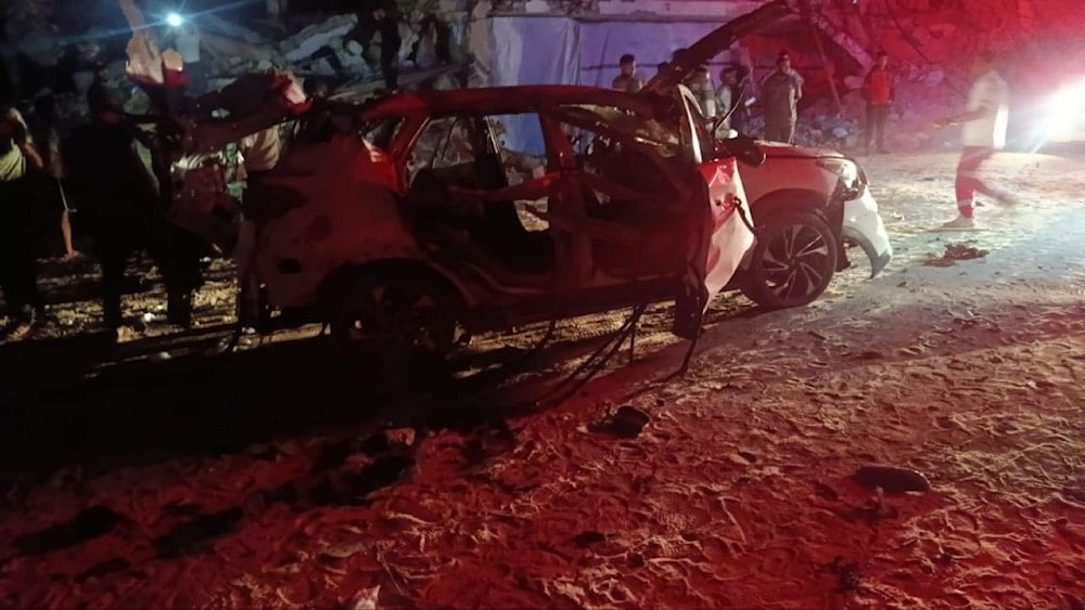 The wreckage of a car targeted by 'Israel' in an airstrikes in Khan Younis, Gaza, Occupied Palestine, October 28, 2025 (social media)