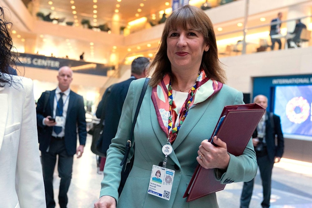 Britain's Chancellor of the Exchequer Rachel Reeves walks to the G20 meeting during the World Bank/IMF Annual Meetings at the International Monetary Fund (IMF) headquarters in Washington, Thursday, Oct. 16, 2025 (AP)