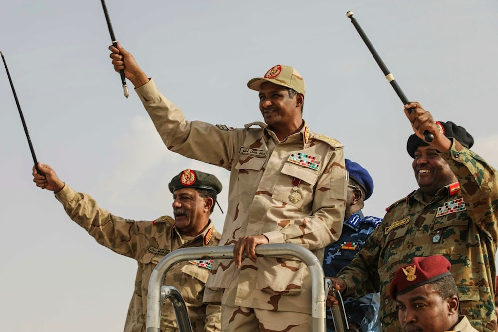 Gen. Mohammed Hamdan Dagalo, centre, the deputy head of the military council, greets the crowd during a military-backed tribe's rally, in the Nile River State, Sudan, Saturday, July 13, 2019 (AP)