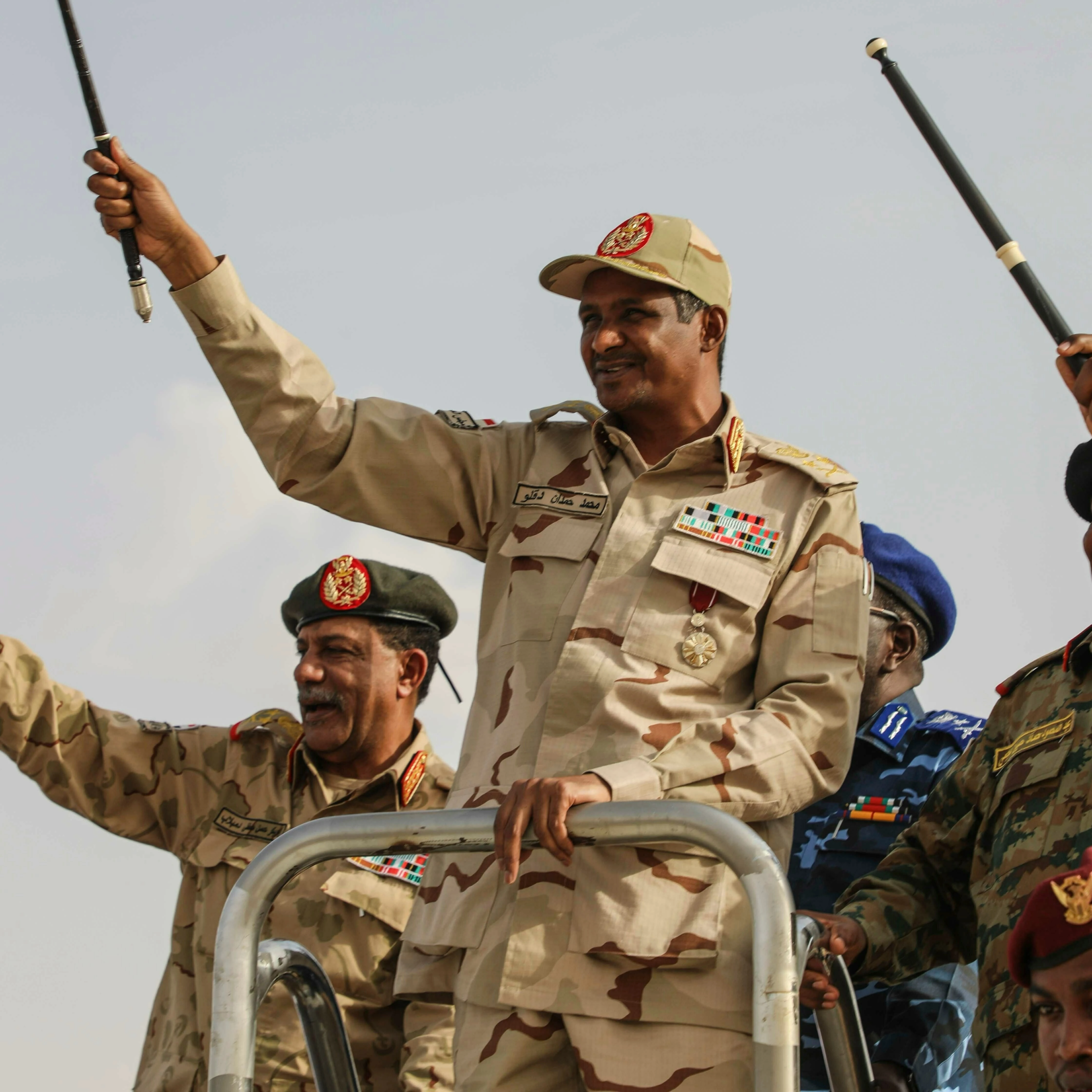 Gen. Mohammed Hamdan Dagalo, centre, the deputy head of the military council, greets the crowd during a military-backed tribe's rally, in the Nile River State, Sudan, Saturday, July 13, 2019 (AP)