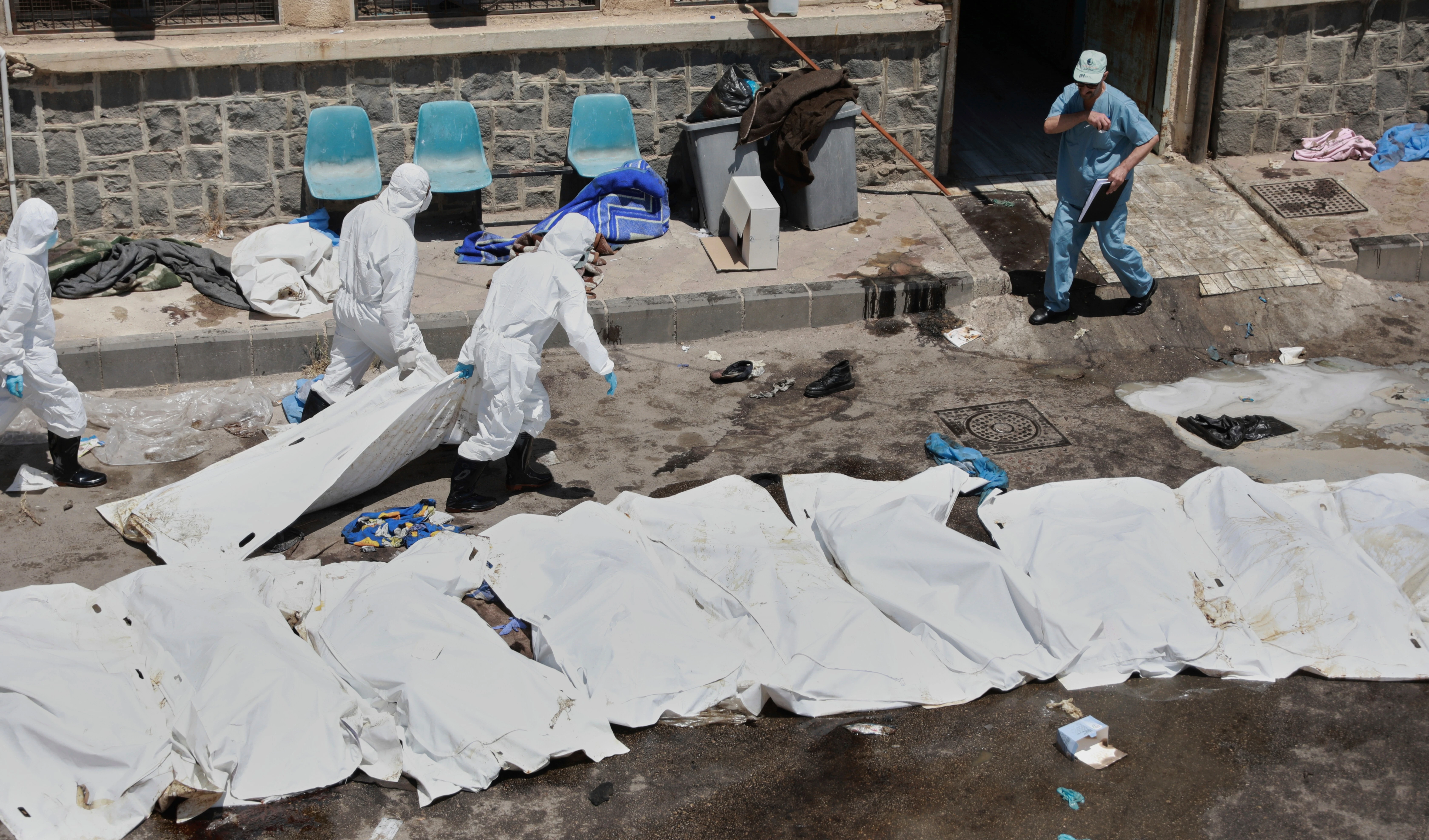 Morgue workers place the bodies of unidentified people killed during clashes between Bedouin clans and Druze militias, into plastic bags outside the National Hospital in Sweida, Syria, Monday, July 21, 2025 (AP) Morgue workers place the bodies of unidentified people killed during clashes between Bedouin clans and Druze militias, into plastic bags outside the National Hospital in Sweida, Syria, Monday, July 21, 2025 (AP)