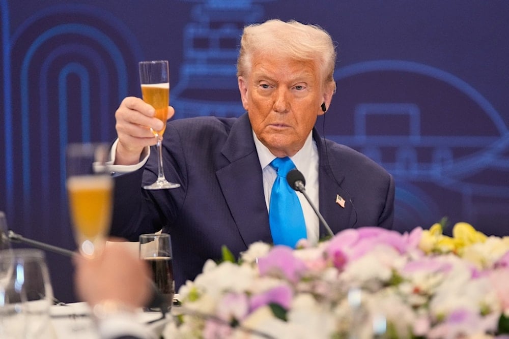 President Donald Trump toasts with state leaders during a dinner event hosted by South Korean President Lee Jae Myung in Gyeongju, South Korea, Wednesday, October 29, 2025. (AP Photo/Mark Schiefelbein)