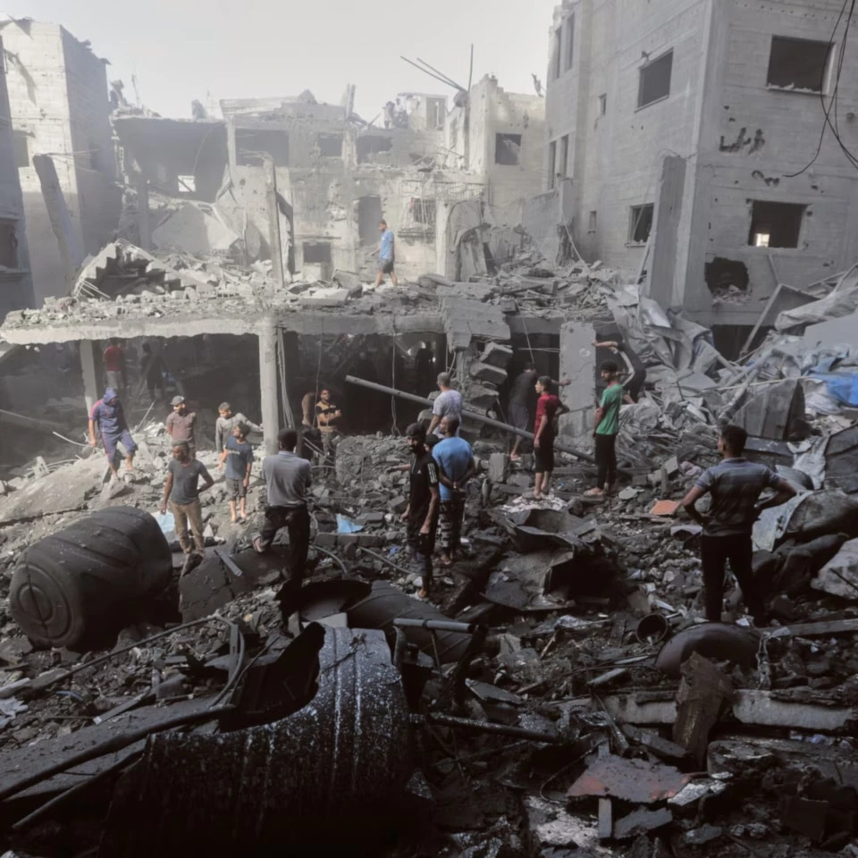 Palestinians inspect the rubble of a building, destroyed by an Israeli army strike at Al-Shati camp in Gaza City Wednesday, Oct. 29, 2025 (AP)