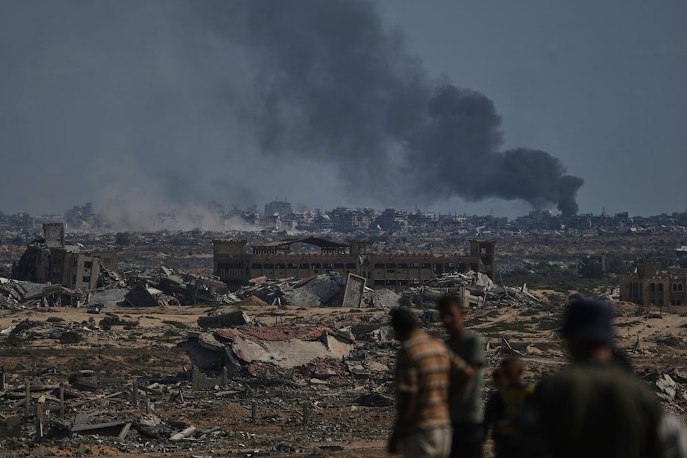 Smoke rises to the sky following an Israeli military strike in Gaza City, as seen from the central Gaza Strip, Thursday, Oct. 2, 2025 (AP)