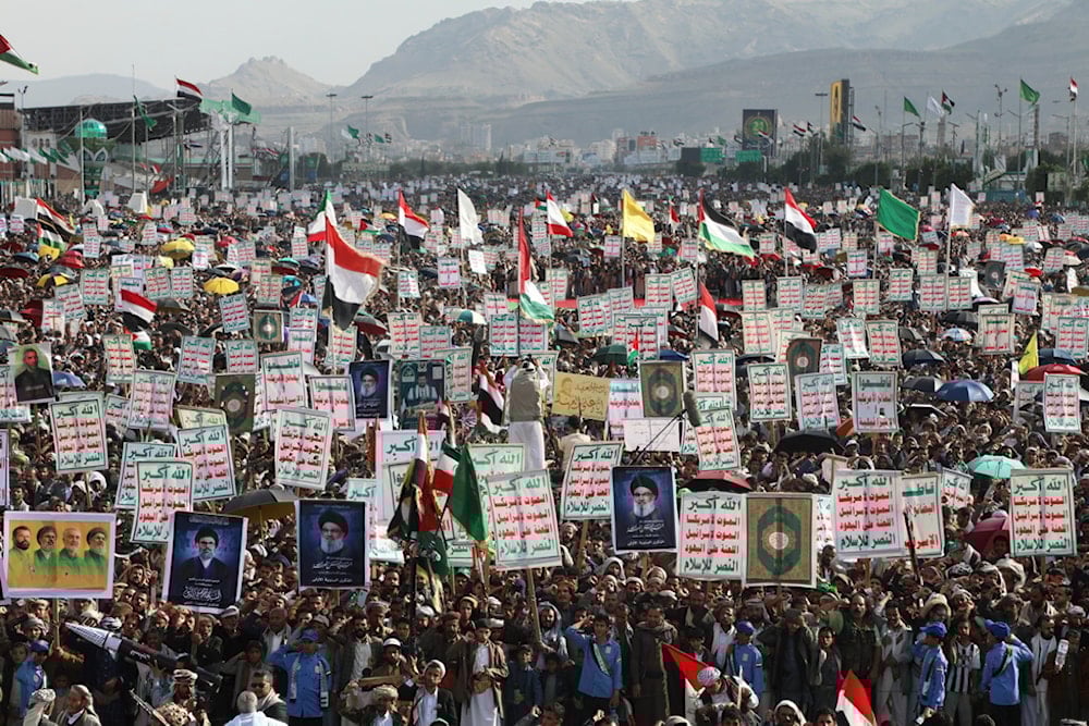 Yemenis chant slogans as they raise posters of Hezbollah leader Sayyed Hassan Nasrallah during an anti-US and anti-Israeli rally in Sanaa, Yemen, following Israeli airstrikes in Sanaa, Yemen, Friday, September 26, 2025 (AP)