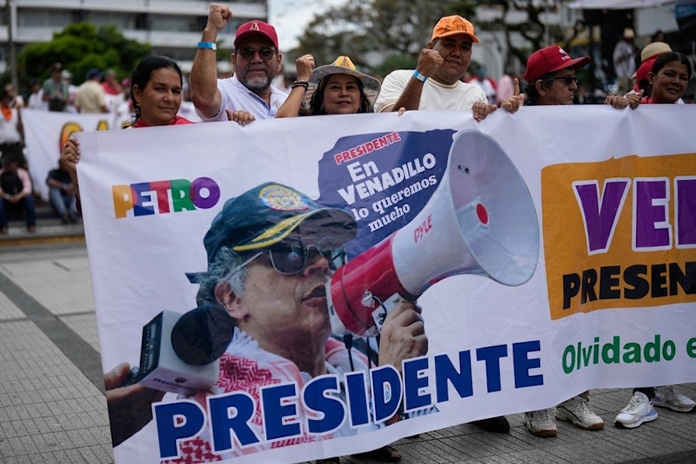 Supporters of President Gustavo Petro attend a rally, ahead of his first appearance since the United States revoked his visa, in Ibague, Colombia, Friday, Oct. 3, 2025. (AP)