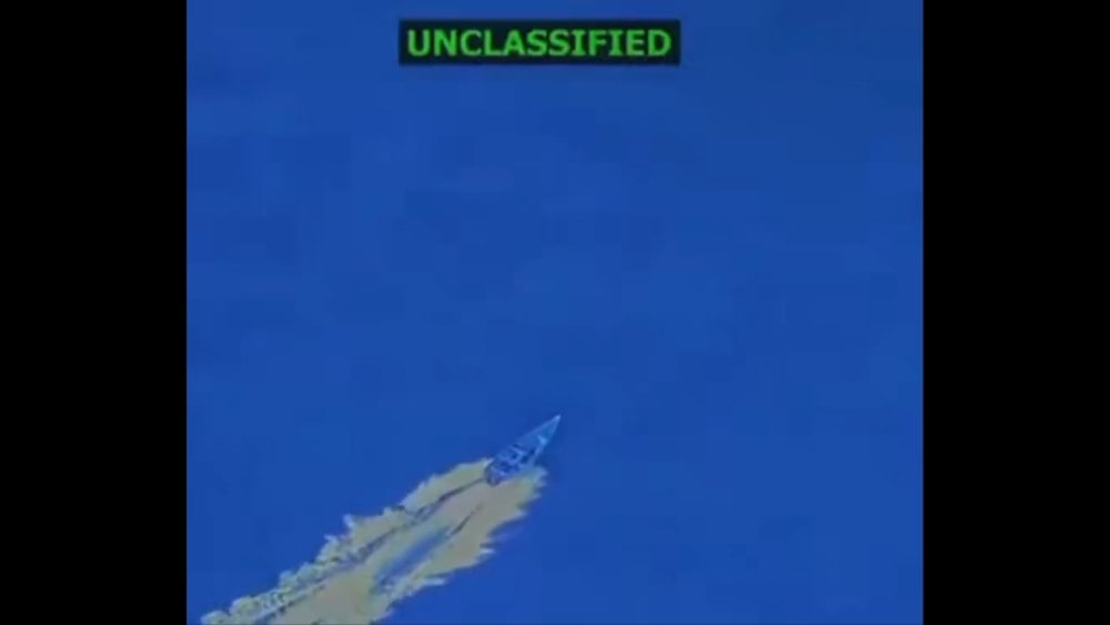 A US military video shows a small vessel speeding through international waters off Venezuela's coast moments before being struck and engulfed in flames