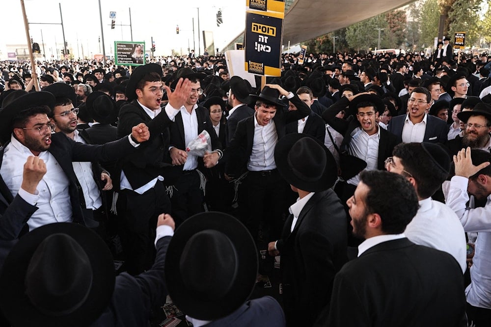 Ultra-Orthodox Jews attend the