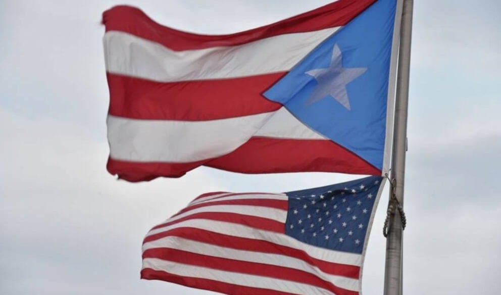 The US and Puerto Rican flags. (AFP)