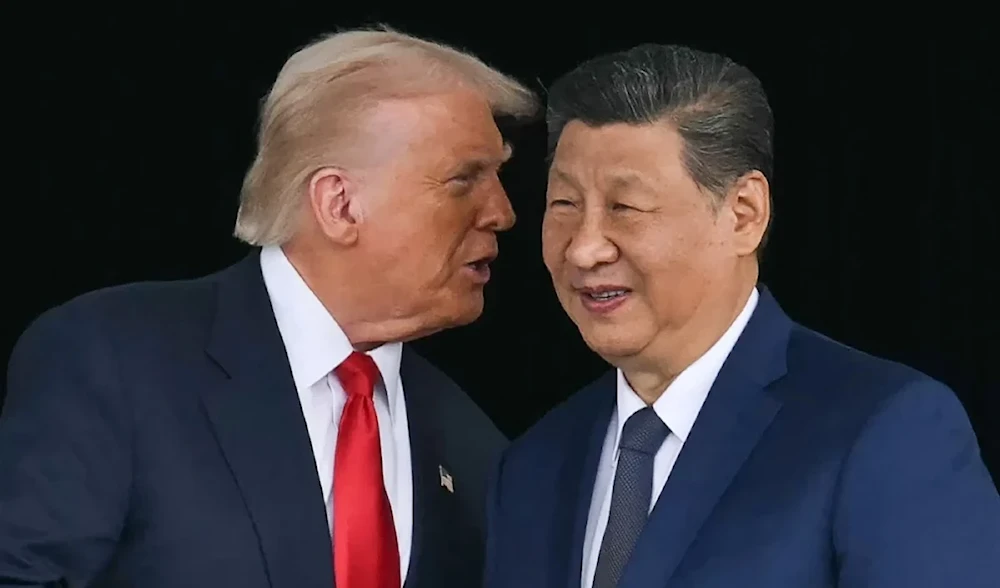 US President Donald Trump talks to China’s President Xi Jinping on October 30, 2025. (AFP/Getty Images)