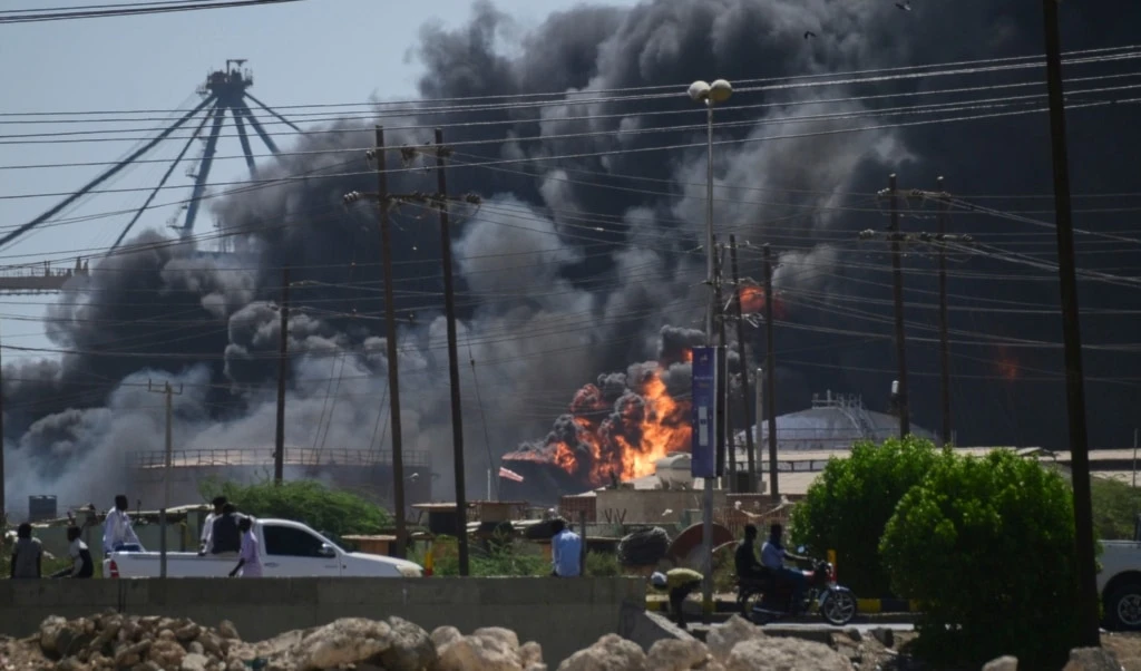Smoke billows after drone strikes by the paramilitary Rapid Support Forces (RSF) targeted the northern port in the Red Sea city of Port Sudan, Sudan, Tuesday, May 6, 2025 (AP) Smoke billows after drone strikes by the paramilitary Rapid Support Forces (RSF) targeted the northern port in the Red Sea city of Port Sudan, Sudan, Tuesday, May 6, 2025 (AP)