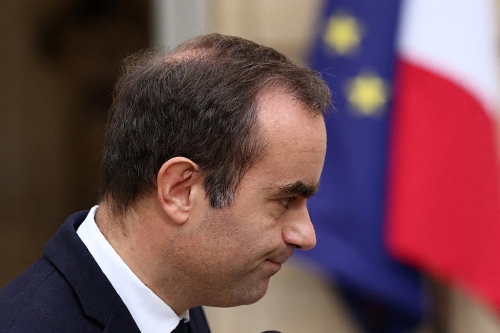 French outgoing Prime Minister Sebastien Lecornu, who resigned just a day after naming his government, reacts after delivering his statement at the Hotel Matignon in Paris, Monday, October 6, 2025. (Stephane Mahe/Pool via AP)