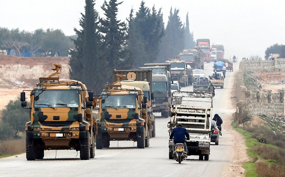 In this Friday, Feb. 28, 2020 file photo, a Turkish military convoy moves in the east of Idlib, Syria (AP)